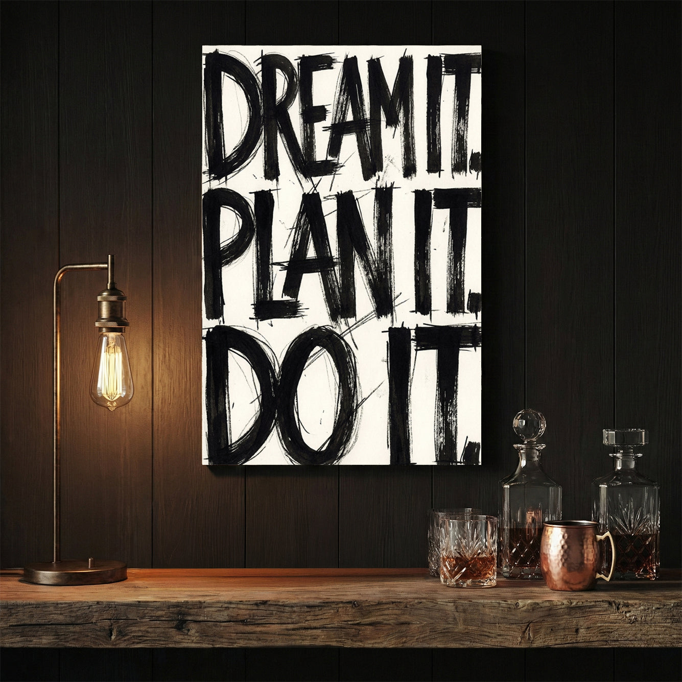 Bold black typography wall art featuring the phrase Dream It Plan It Do It.