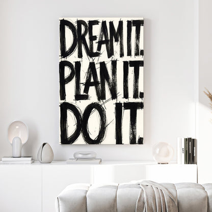 Bold black typography wall art featuring the phrase Dream It Plan It Do It.