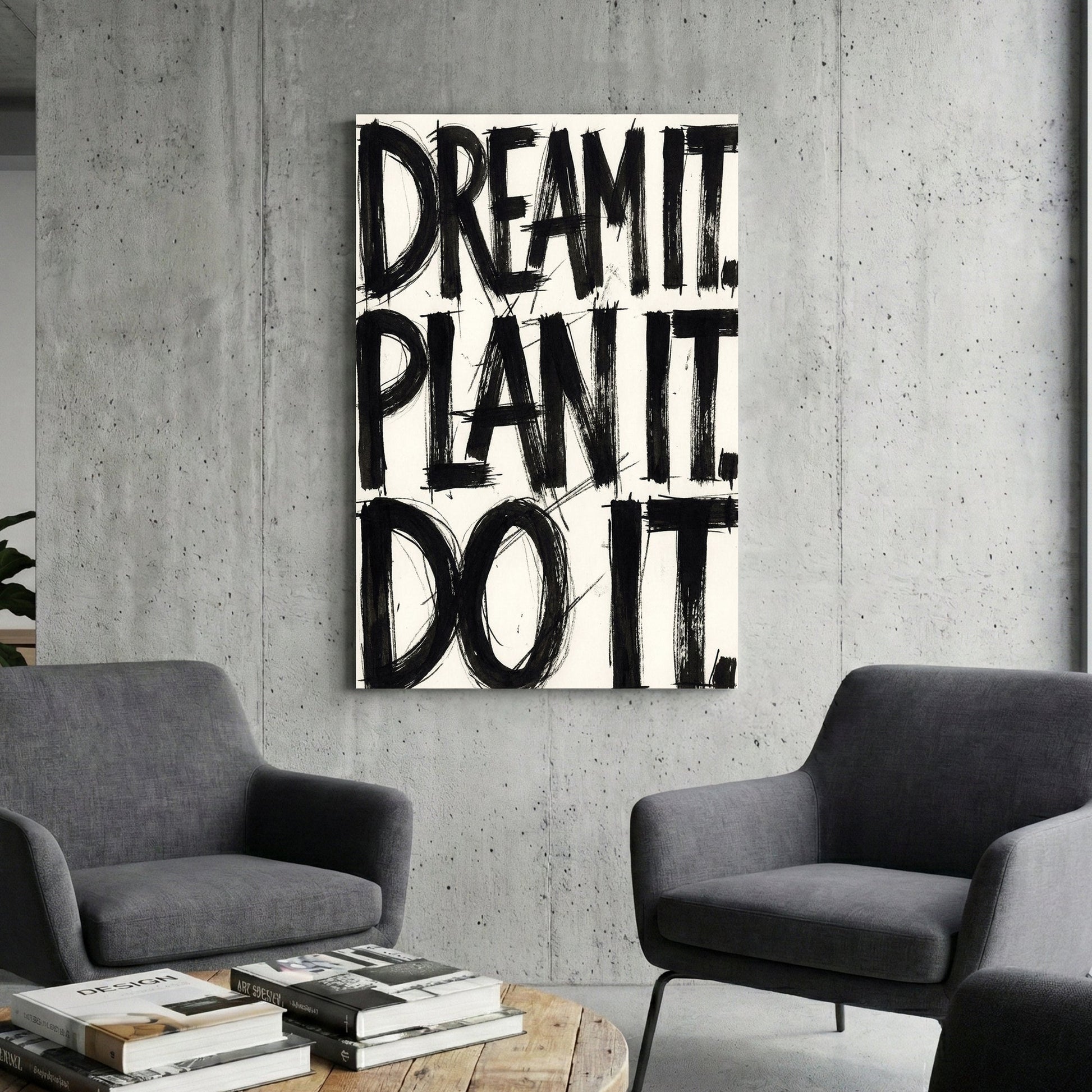Bold black typography wall art featuring the phrase Dream It Plan It Do It.