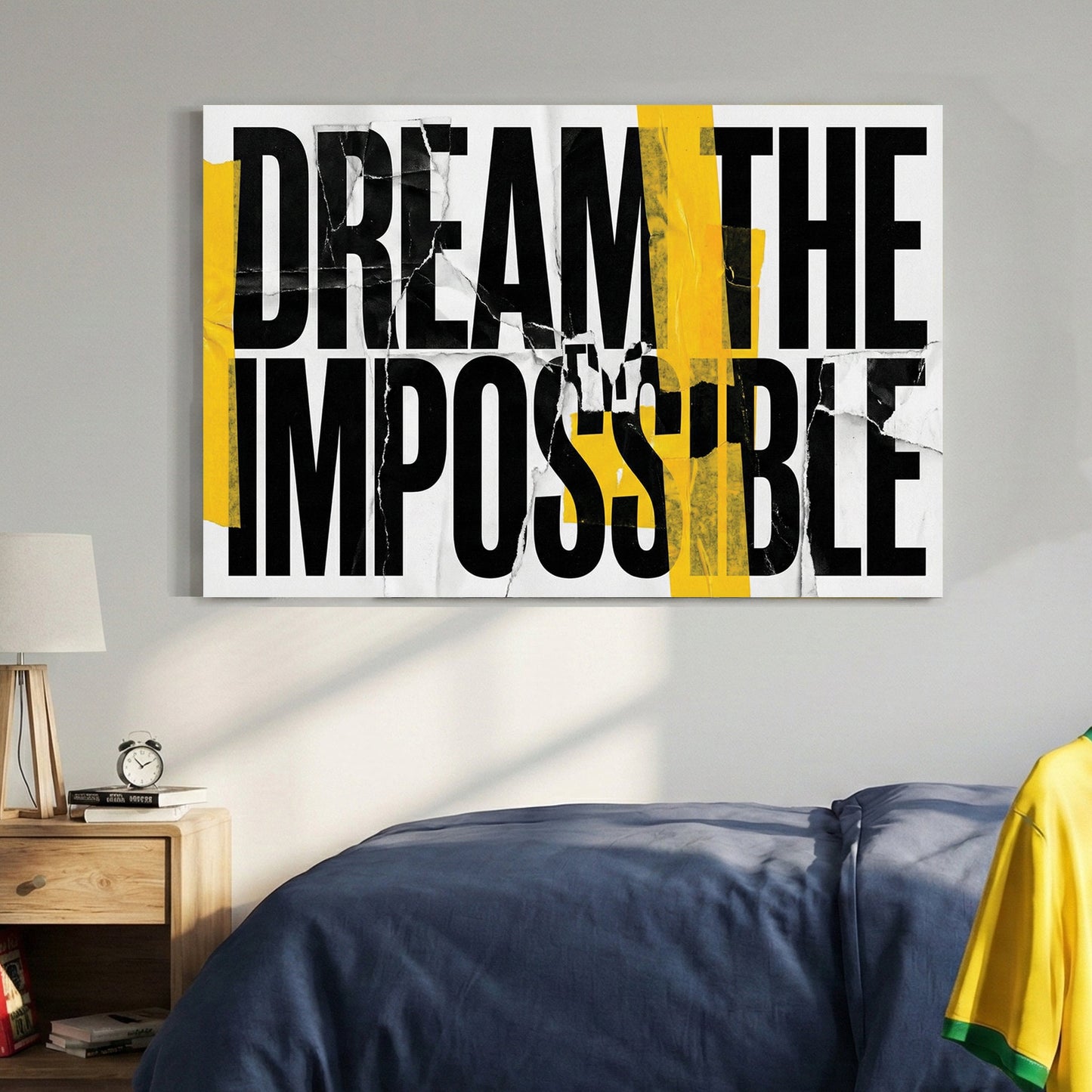 Dream The Impossible motivational typography wall art with yellow tape and torn paper effects.