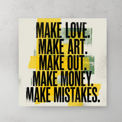 Typography wall art featuring 'Make Love Make Art' text and yellow abstract blocks.