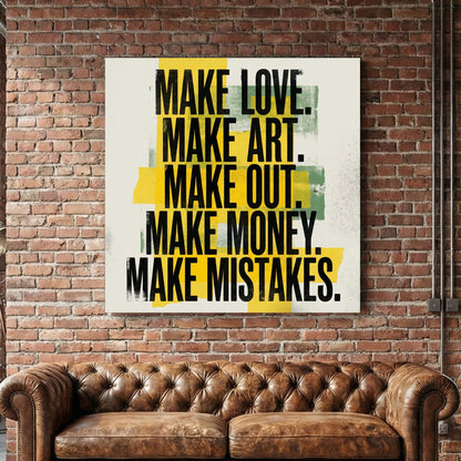Typography wall art featuring 'Make Love Make Art' text and yellow abstract blocks.