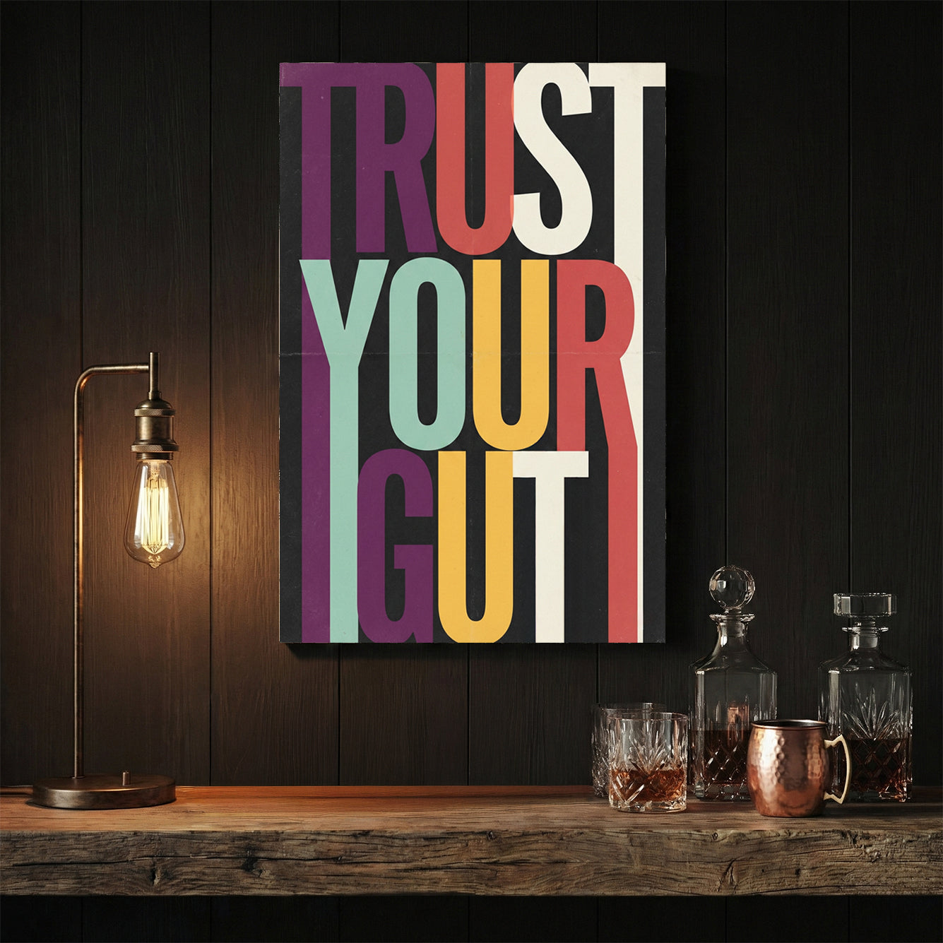 Modern Trust Your Gut typography wall art with colourful elongated letters on black background.