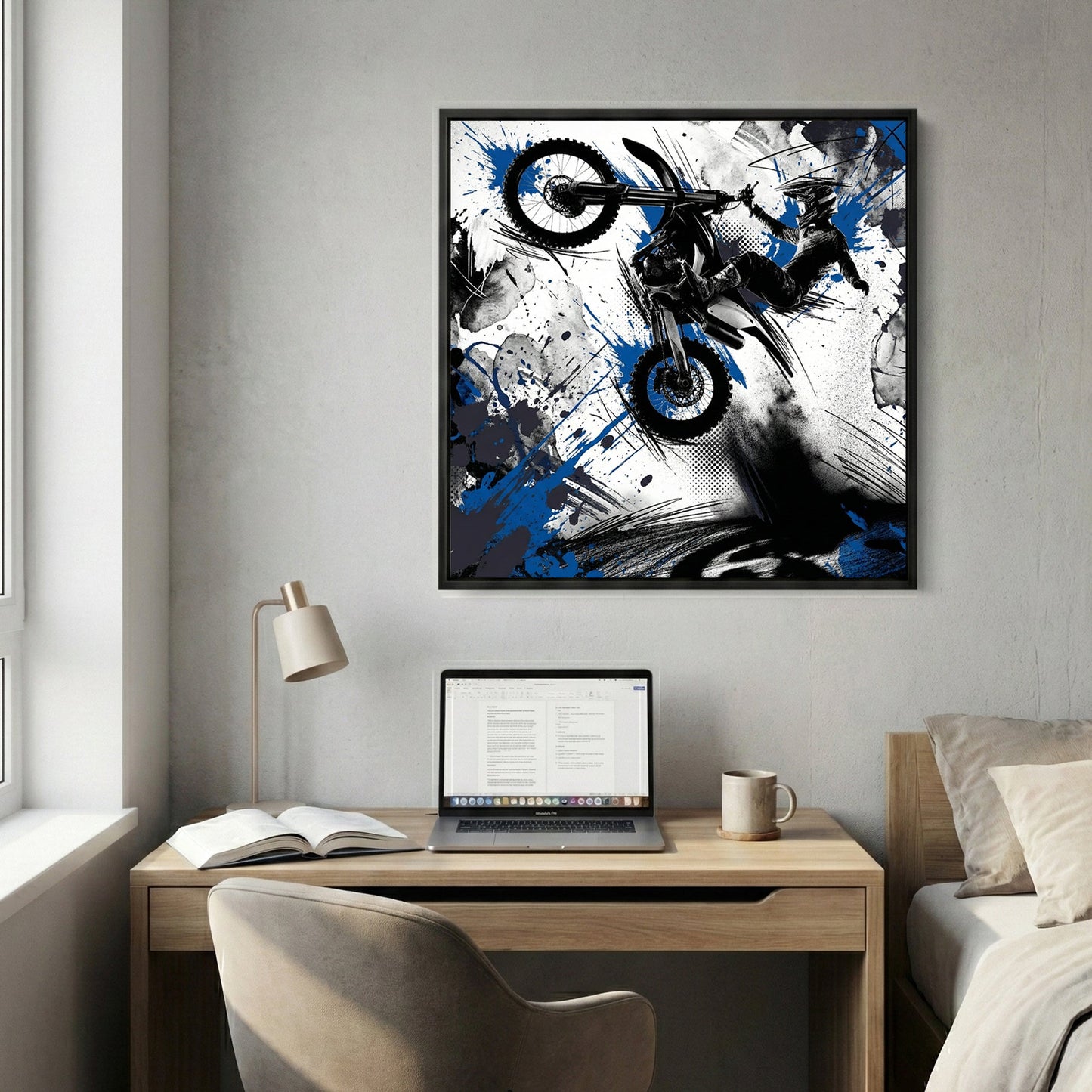Motocross rider on bike in mid-jump with blue ink splatters and geometric design