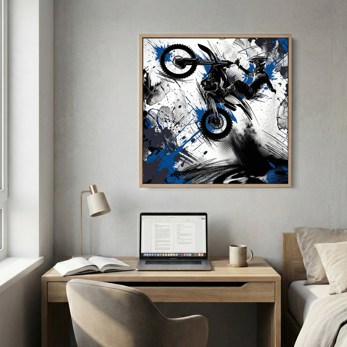 Motocross rider on bike in mid-jump with blue ink splatters and geometric design