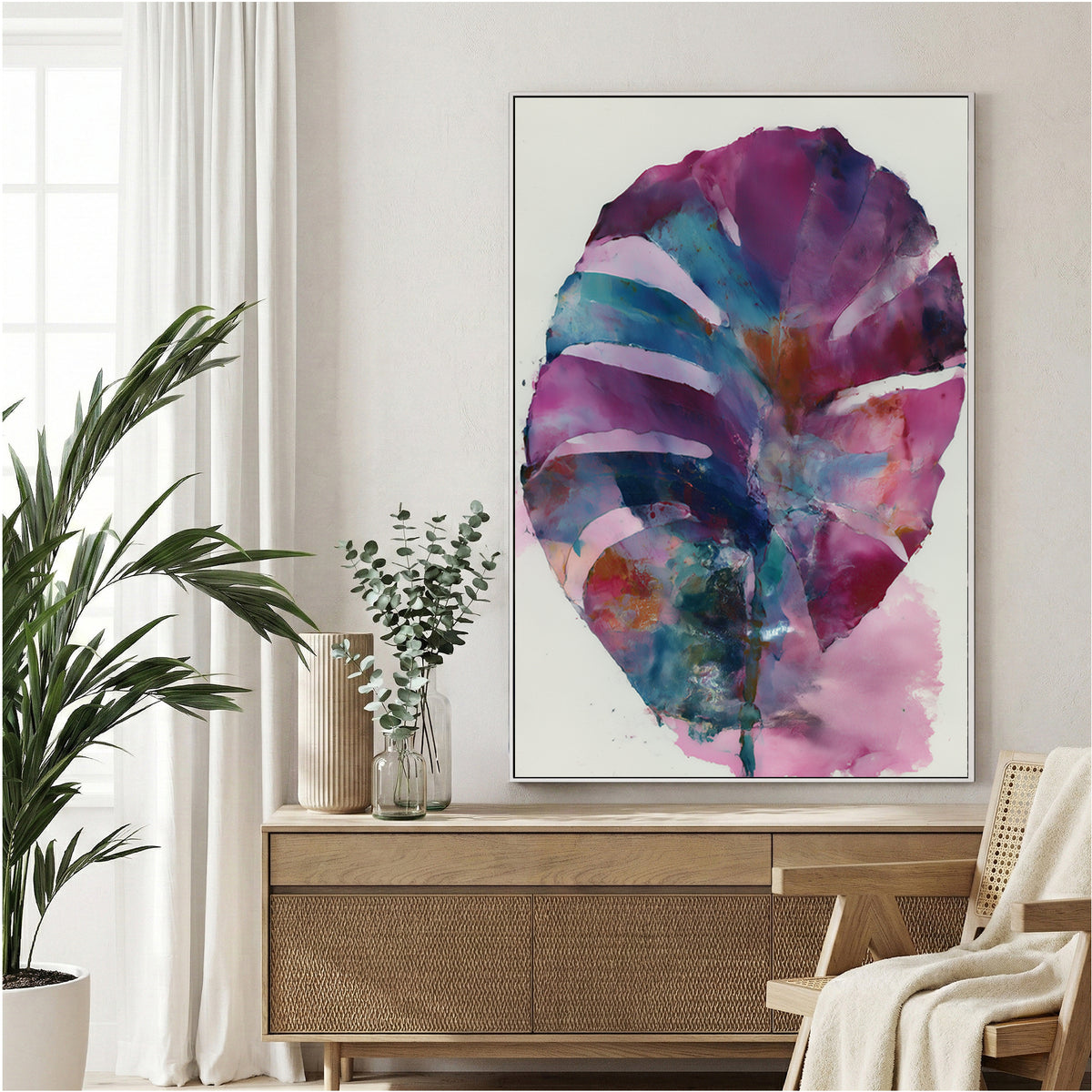 Large leaf plant watercolour with purple, teal, pink, and warm earth tone washes