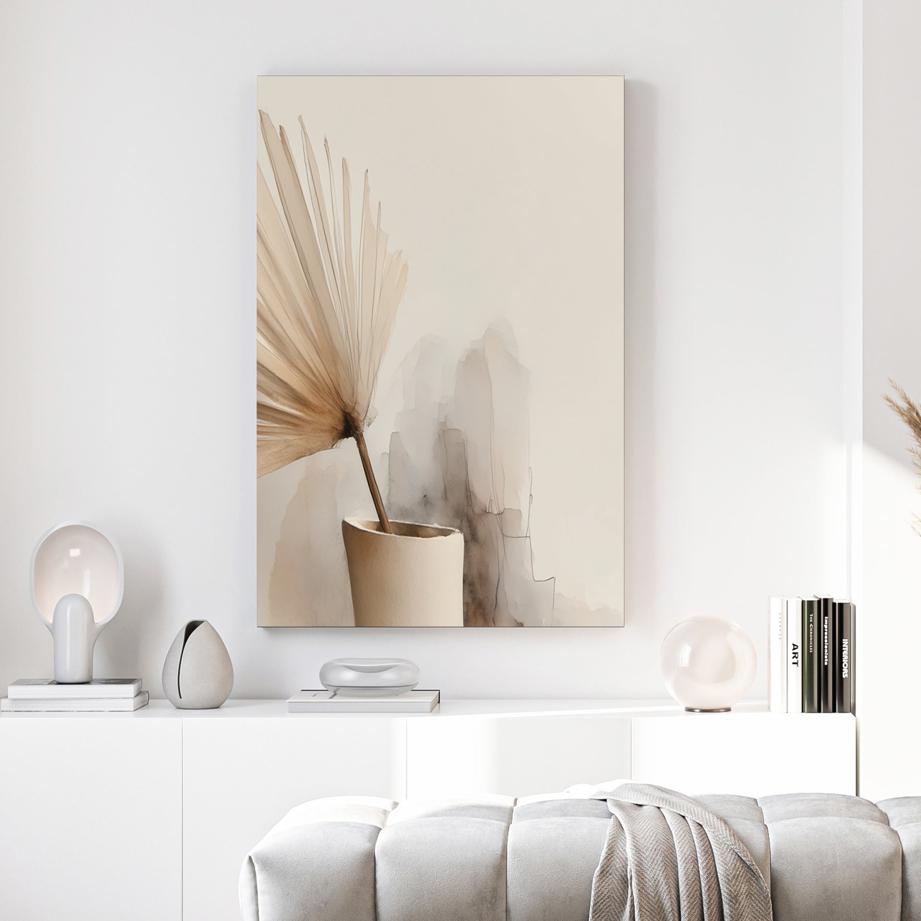 Minimalist vase with floral stems in soft neutral tones