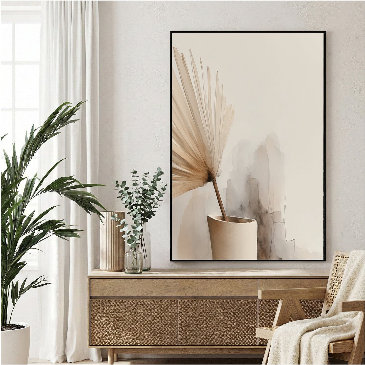 Minimalist vase with floral stems in soft neutral tones