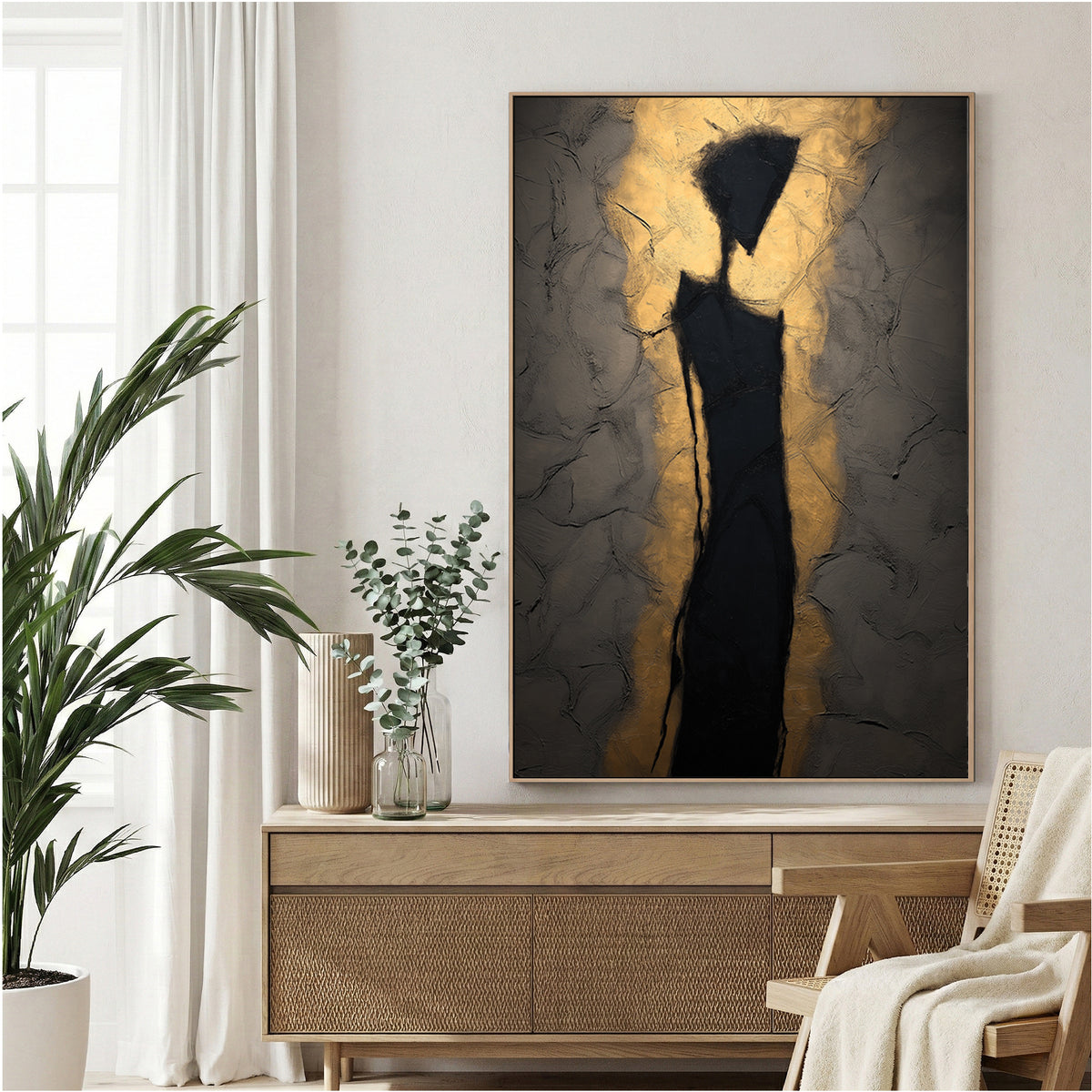 Abstract silhouette figure wall art with golden light