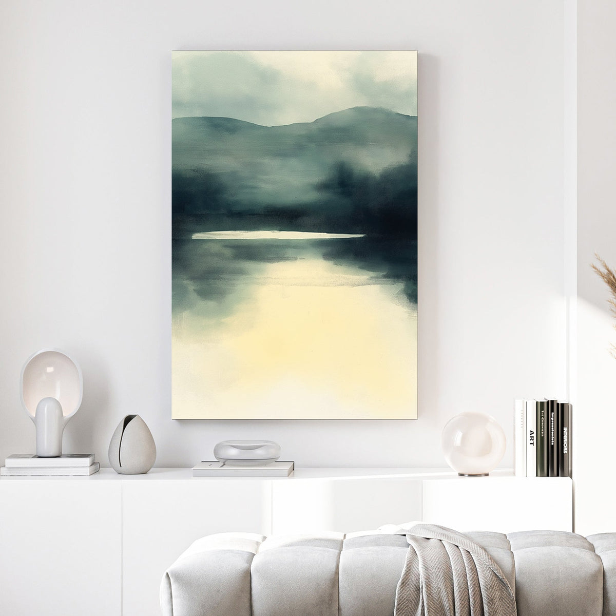 Minimalist mountain landscape with misty lake reflection in grey-blue