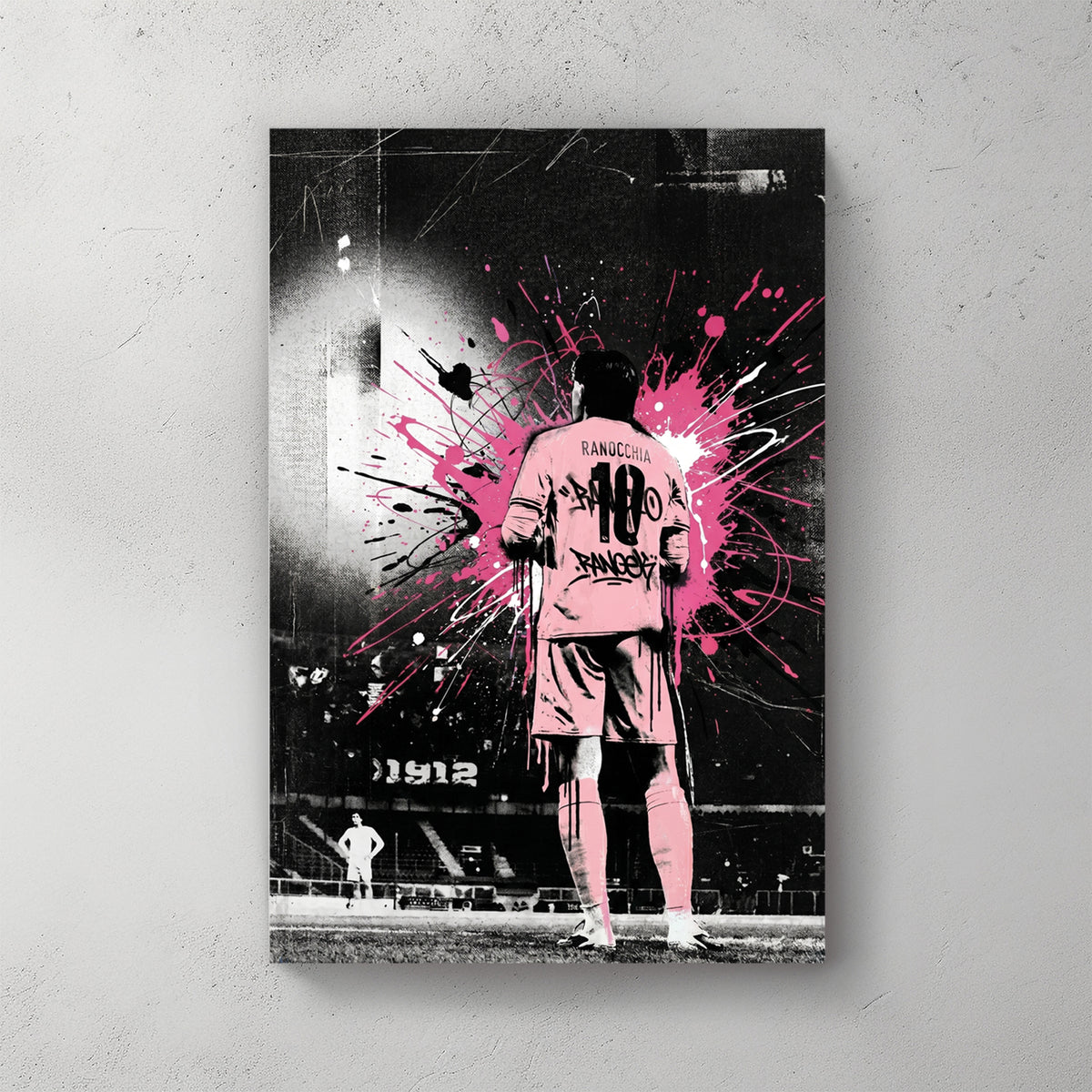 Palermo FC player Ranocchia #18 from behind in pink kit, hot pink splatter background, stadium with 1912 visible — canvas wall art print