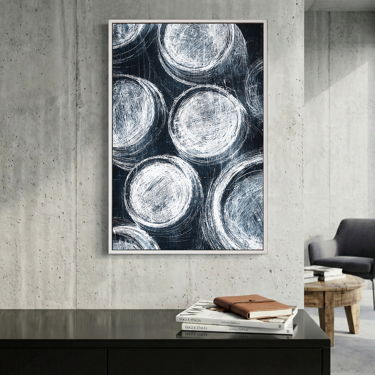 Navy Blue Circles Abstract canvas wall art print displayed in a styled living room