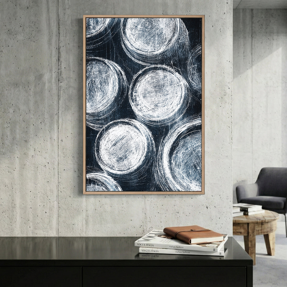 Navy Blue Circles Abstract canvas wall art print displayed in a styled living room