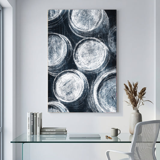 Navy Blue Circles Abstract canvas wall art print displayed in a styled living room