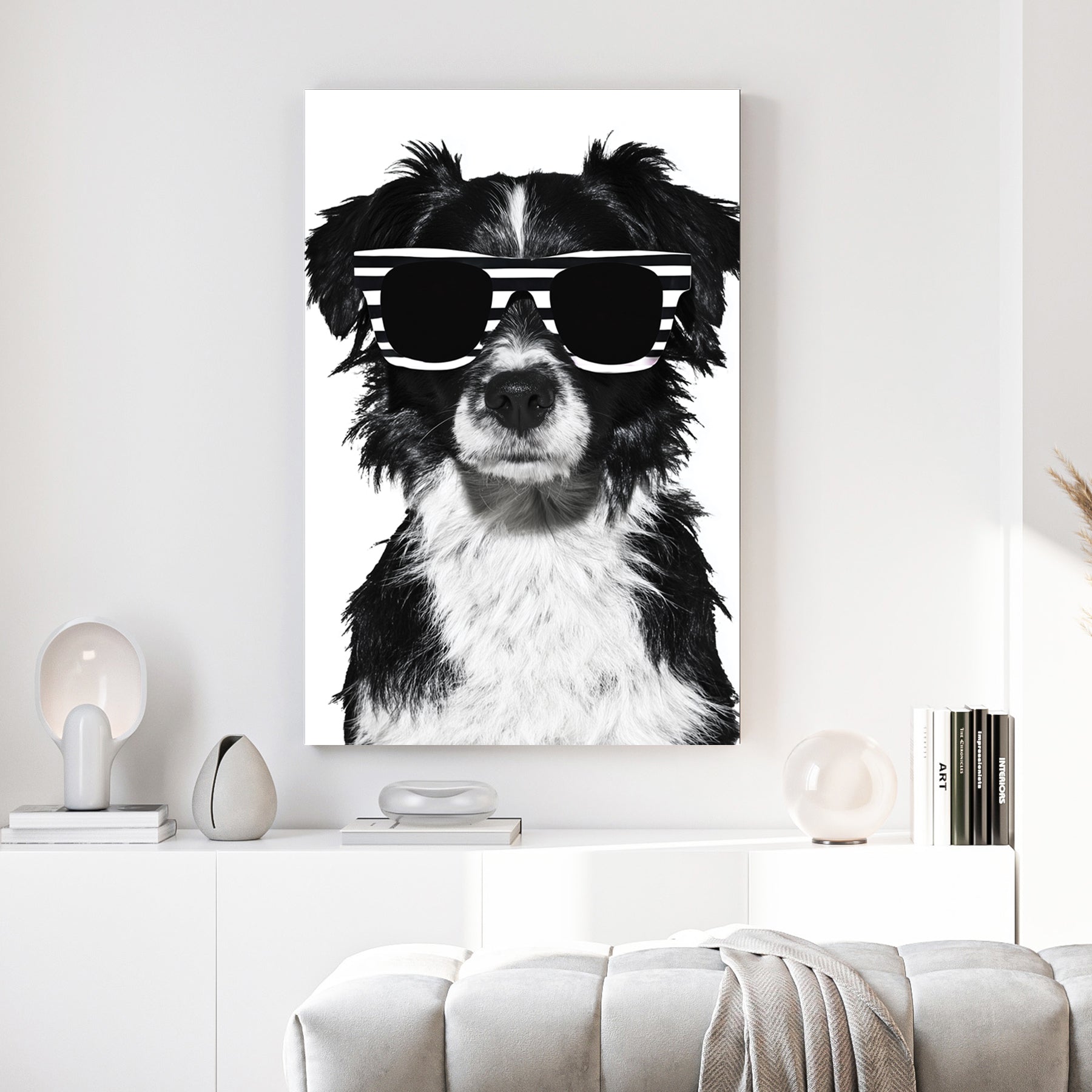 Cool Dog Sunglasses canvas wall art print above a sofa in a contemporary living room