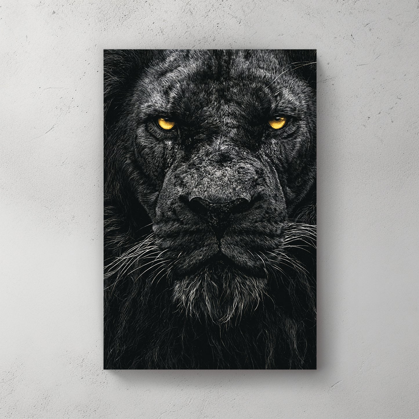 Close-up portrait of a black lion: glowing gold-yellow eyes, dark mane filling the frame, high contrast moody style — canvas wall art print