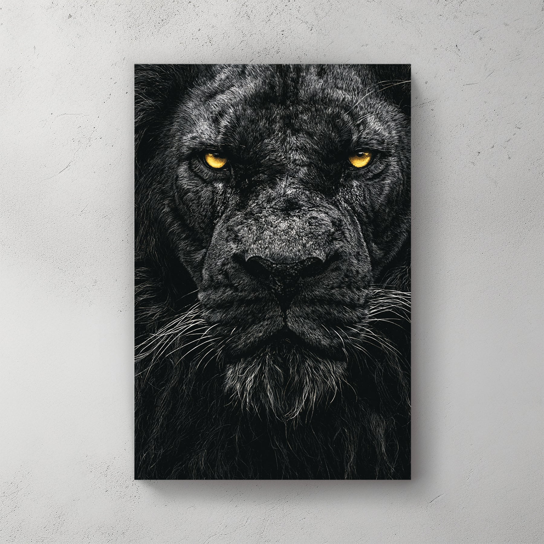 Close-up portrait of a black lion: glowing gold-yellow eyes, dark mane filling the frame, high contrast moody style — canvas wall art print