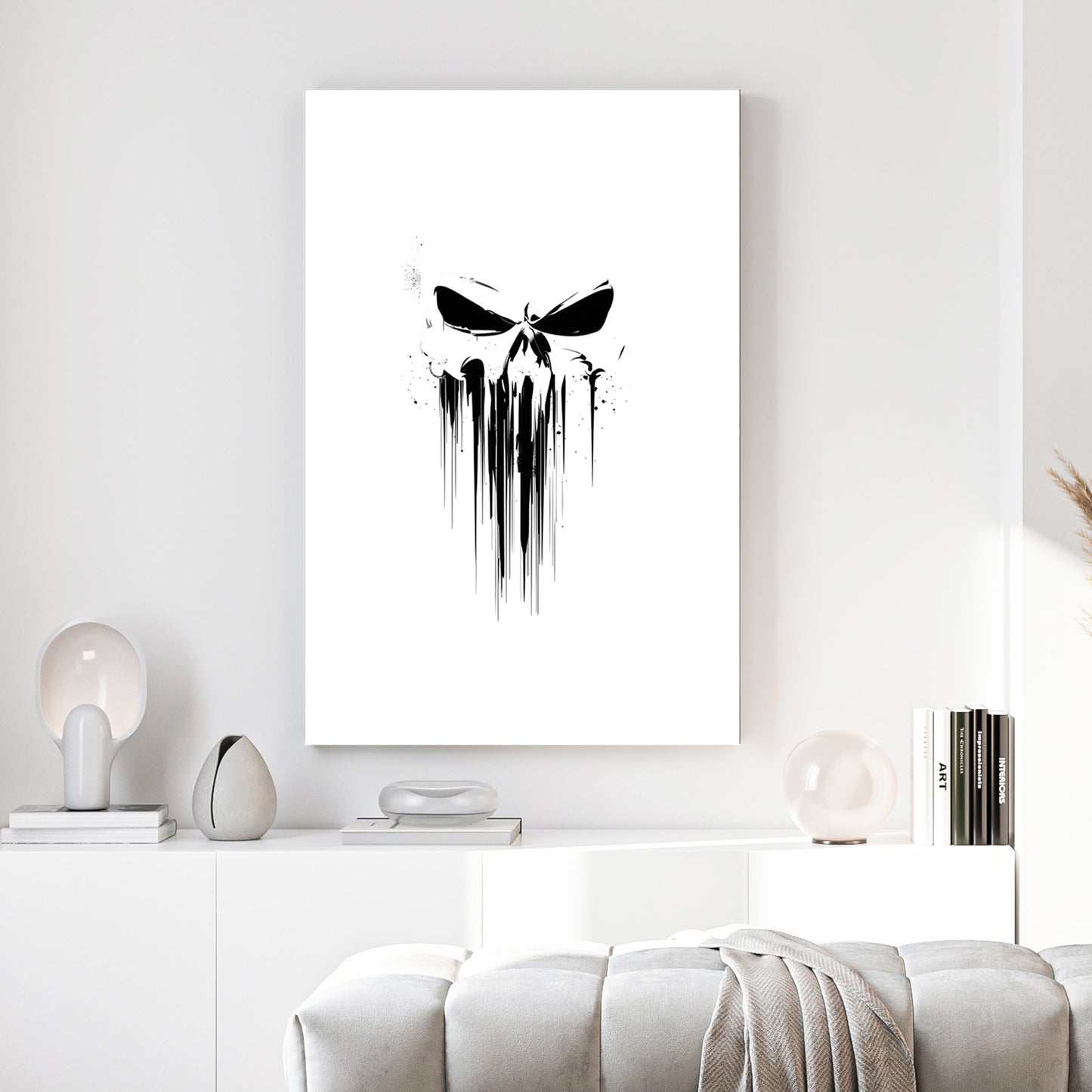 Dripping Skull Minimalist canvas wall art print above a sofa in a contemporary living room