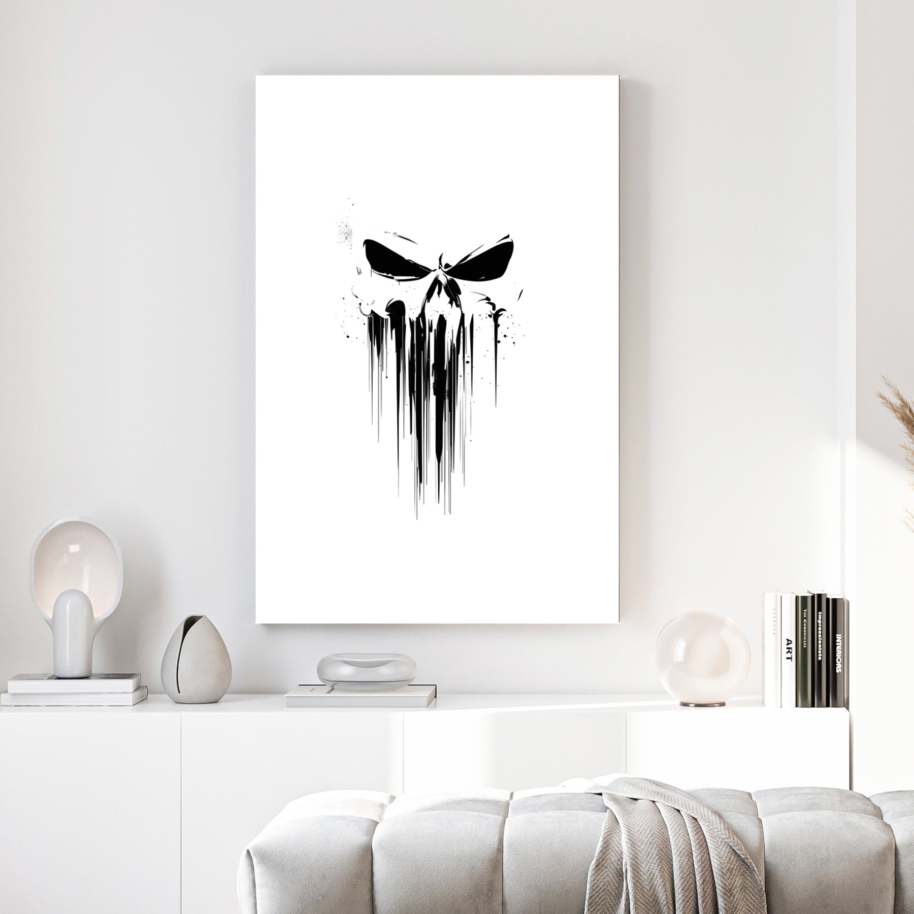 Dripping Skull Minimalist canvas wall art print above a sofa in a contemporary living room