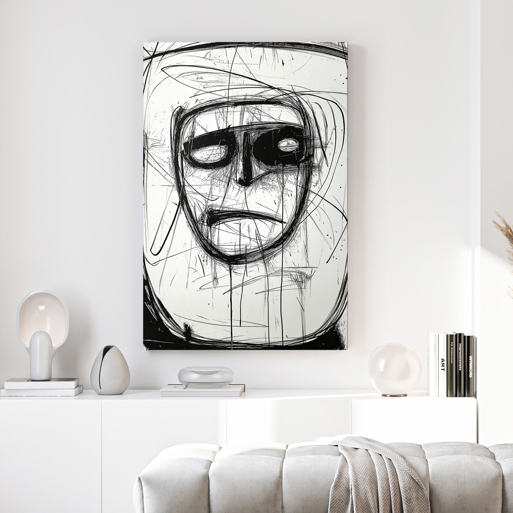 Abstract Ink Face canvas wall art print above a sofa in a contemporary living room