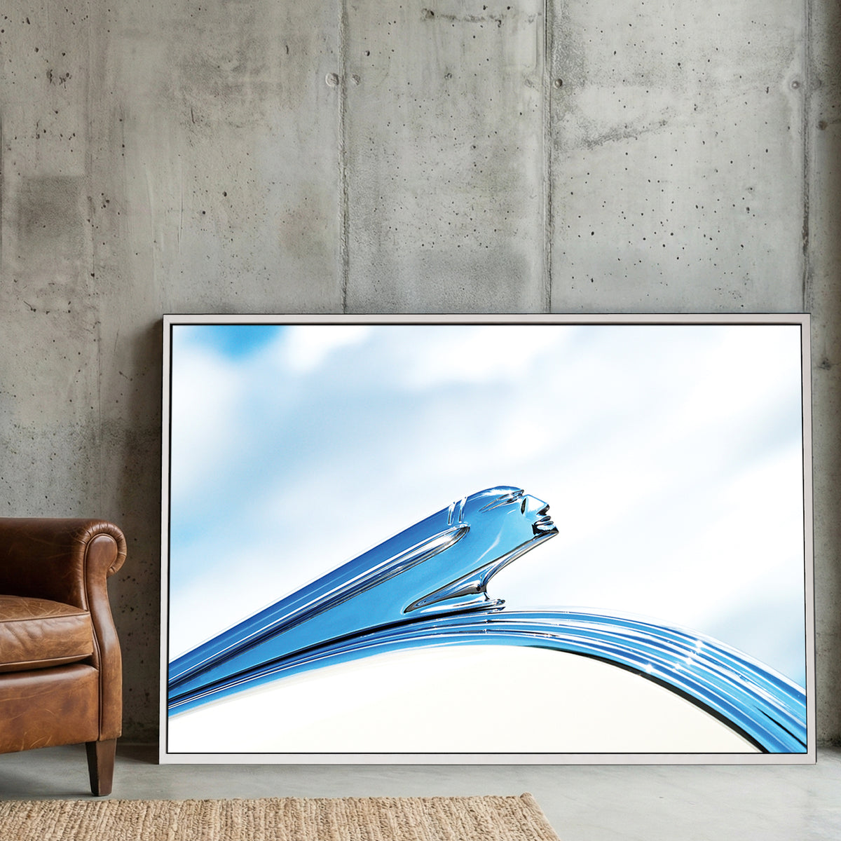 Vintage Pontiac Hood Ornament canvas wall art print displayed in a styled living room