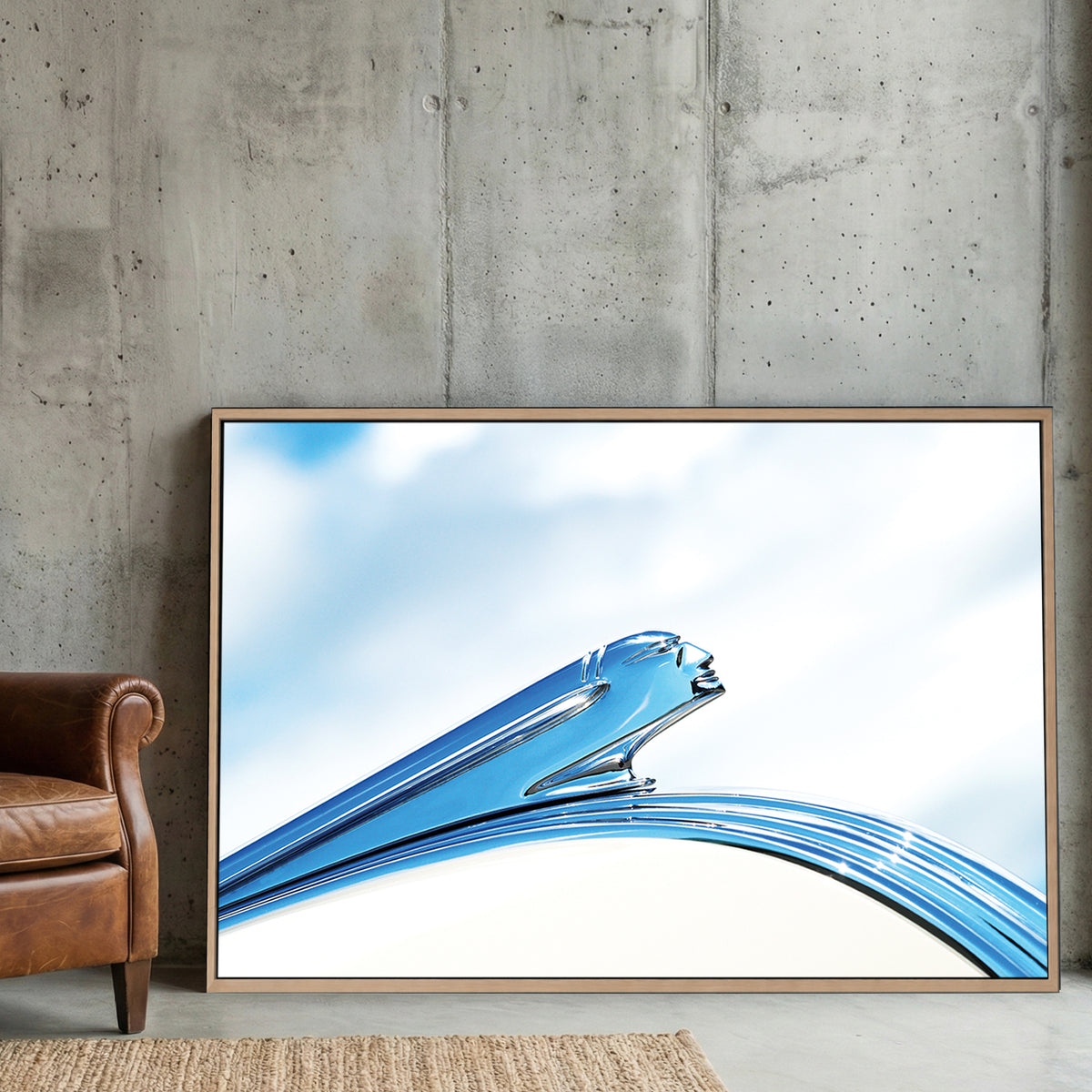 Vintage Pontiac Hood Ornament canvas wall art print displayed in a styled living room