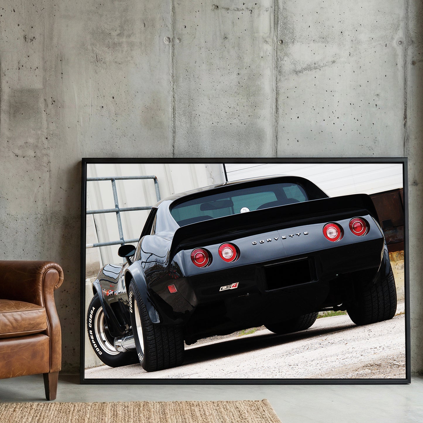 Black Corvette Stingray Rear framed canvas wall art print in a gallery-style display