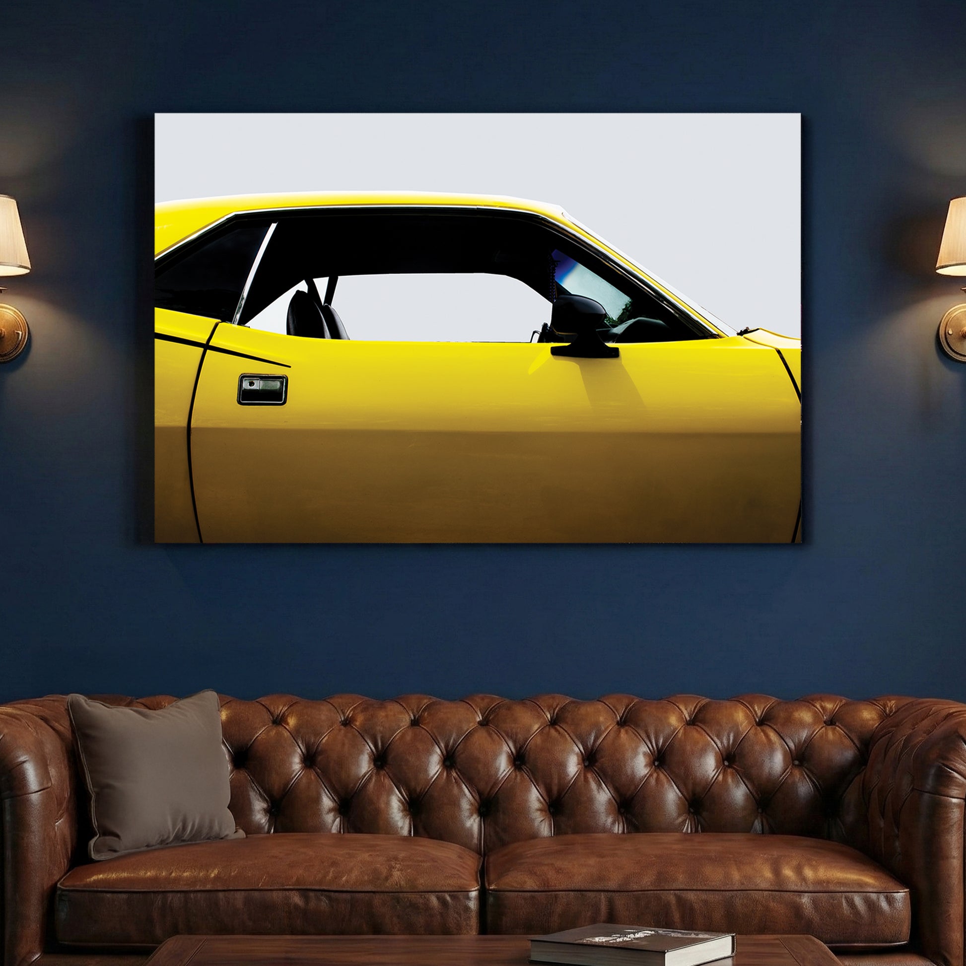 Yellow Plymouth Cuda canvas wall art print above a sofa in a contemporary living room