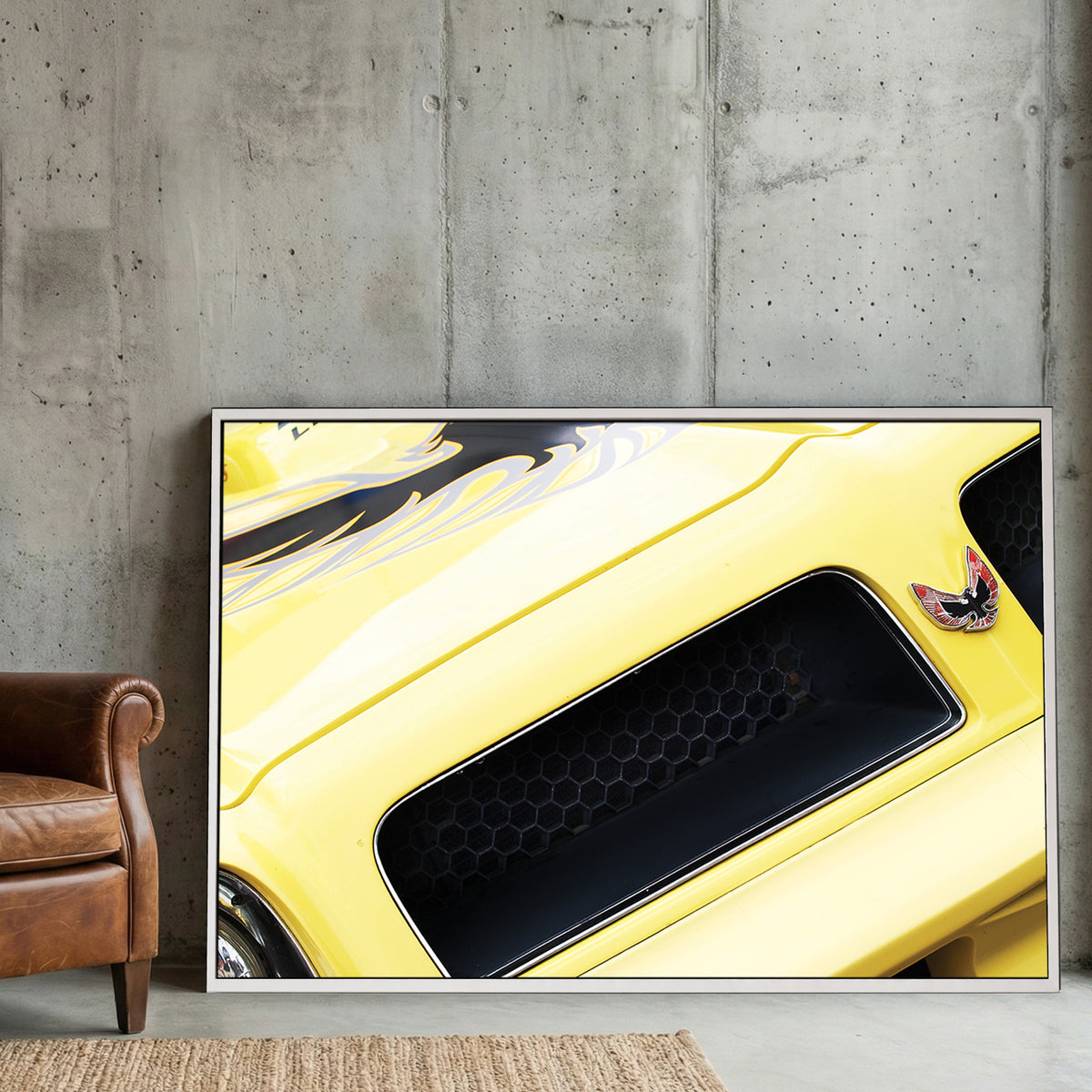 Yellow Trans-Am Firebird Hood canvas wall art print displayed in a styled living room