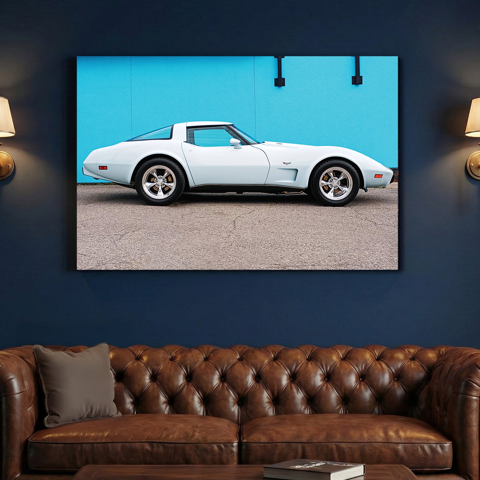 White Corvette Stingray canvas wall art print above a sofa in a contemporary living room