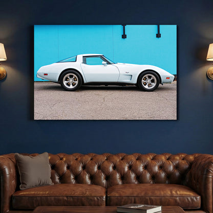 White Corvette Stingray canvas wall art print above a sofa in a contemporary living room