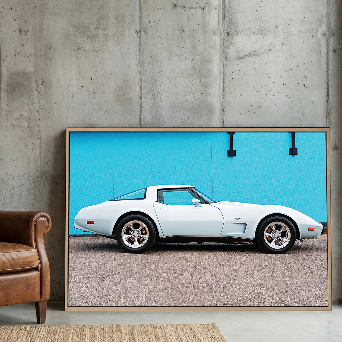 White Corvette Stingray canvas wall art print displayed in a styled living room
