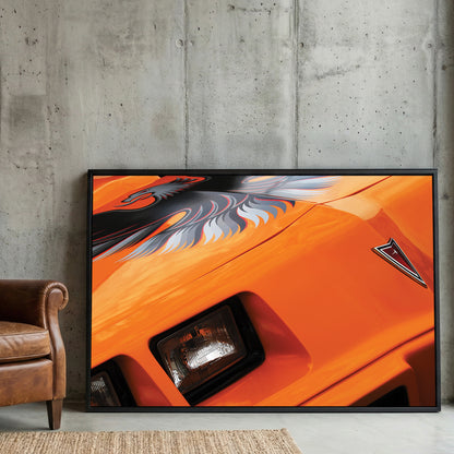 Orange Trans-Am Firebird framed canvas wall art print in a gallery-style display