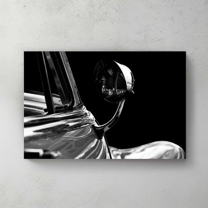Dramatic black-and-white close-up of a chrome bullet side mirror on a dark '53 Buick, deep shadow — canvas wall art print
