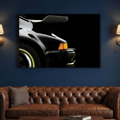 Black Porsche 911 Turbo Wing canvas wall art print above a sofa in a contemporary living room