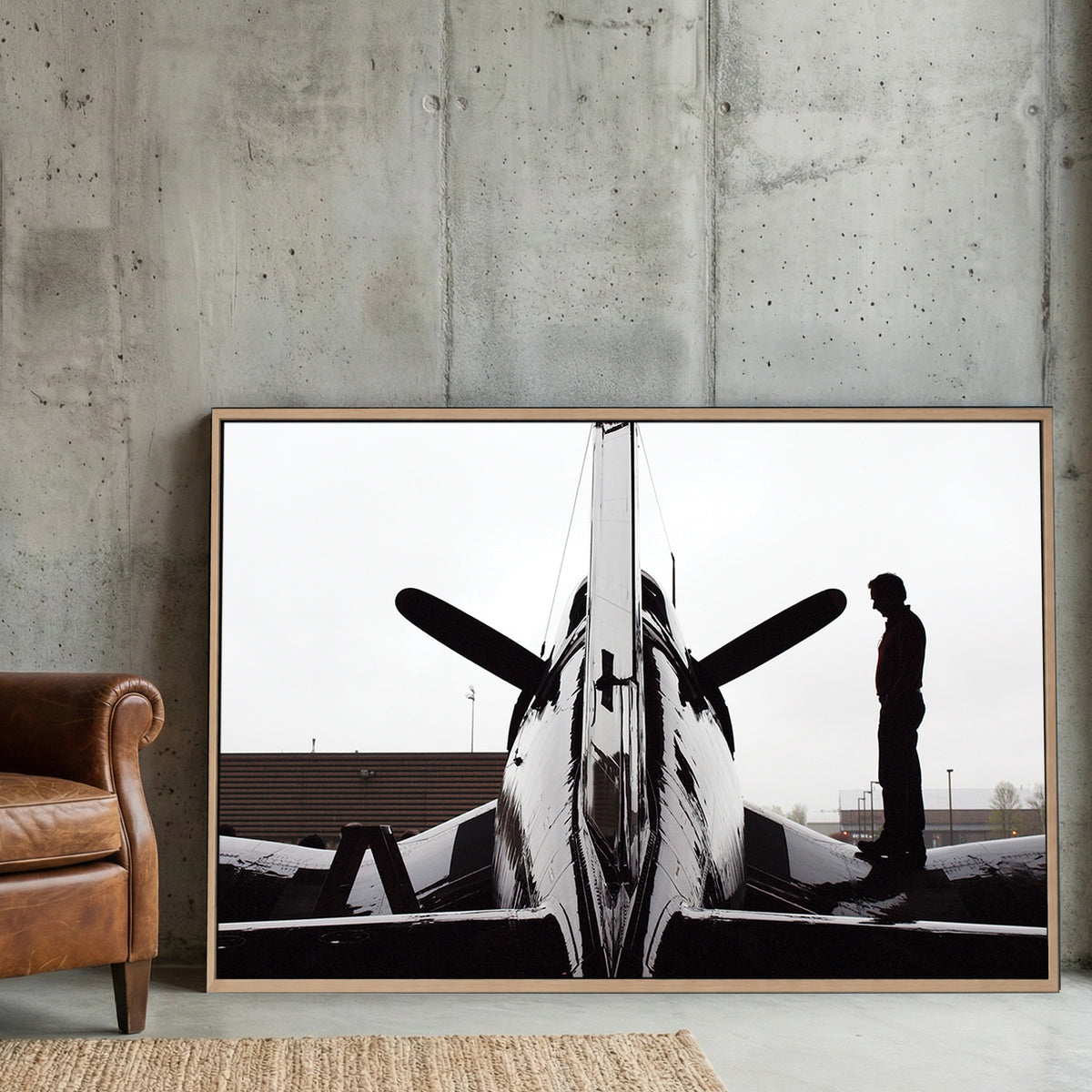 Corsair Warplane Hangar canvas wall art print displayed in a styled living room