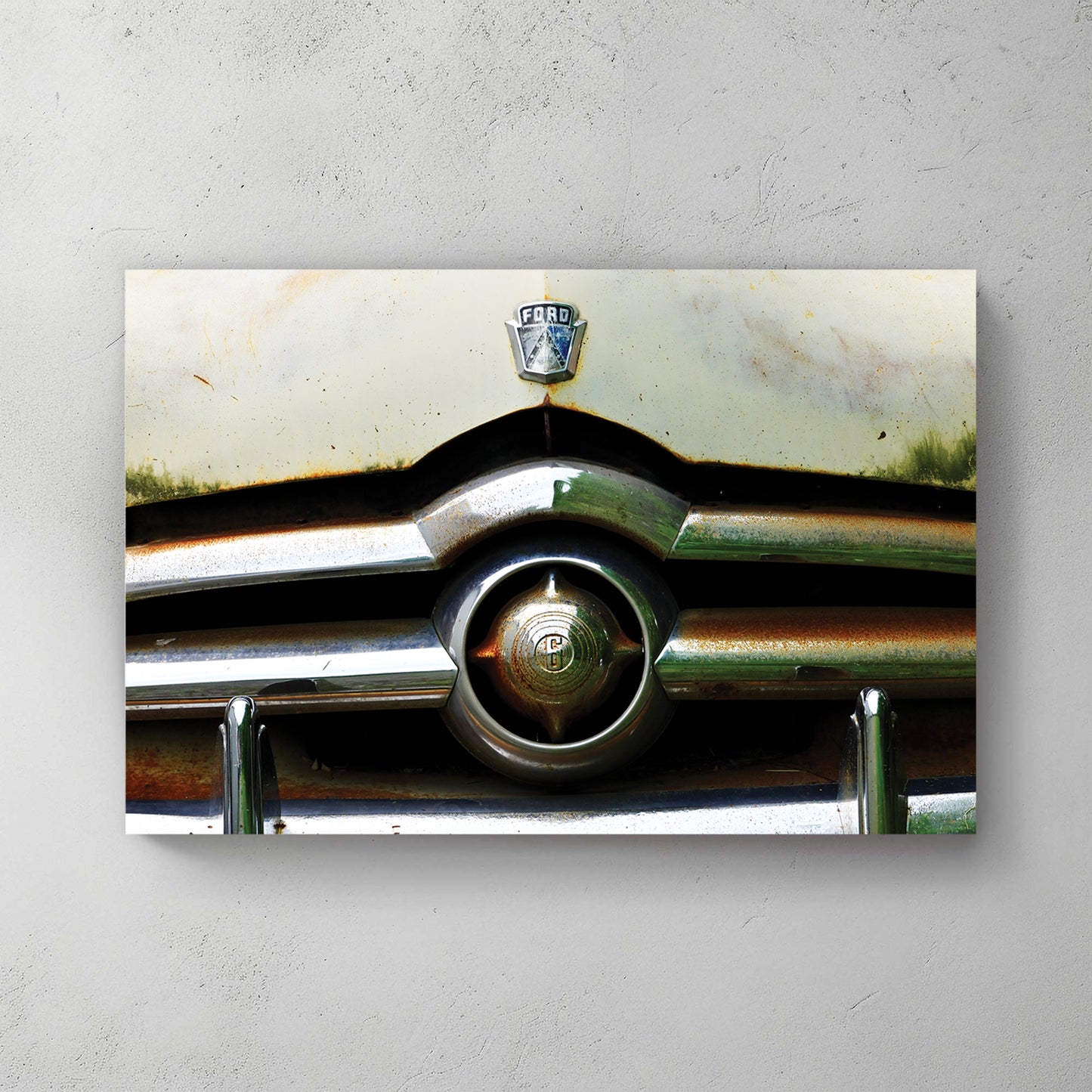 Weathered cream-and-rust vintage Ford front, patina all over the chrome grille and FORD badge — canvas wall art print
