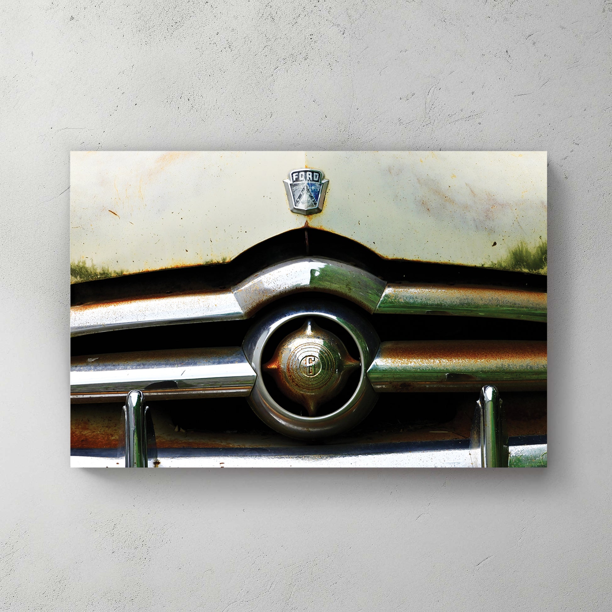 Weathered cream-and-rust vintage Ford front, patina all over the chrome grille and FORD badge — canvas wall art print