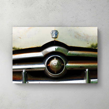 Weathered cream-and-rust vintage Ford front, patina all over the chrome grille and FORD badge — canvas wall art print
