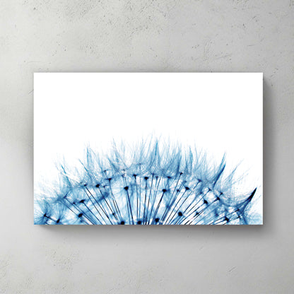 Macro of a dandelion seed head in cool blue tones against a bright white sky, delicate and airy — canvas wall art print