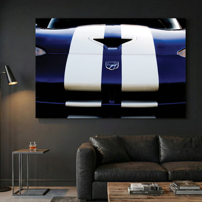 Blue Dodge Viper canvas wall art print displayed in a styled living room
