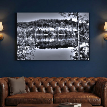 Gatineau River Reflection canvas wall art print above a sofa in a contemporary living room