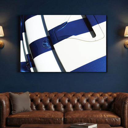 Blue Dodge Viper Hood canvas wall art print above a sofa in a contemporary living room