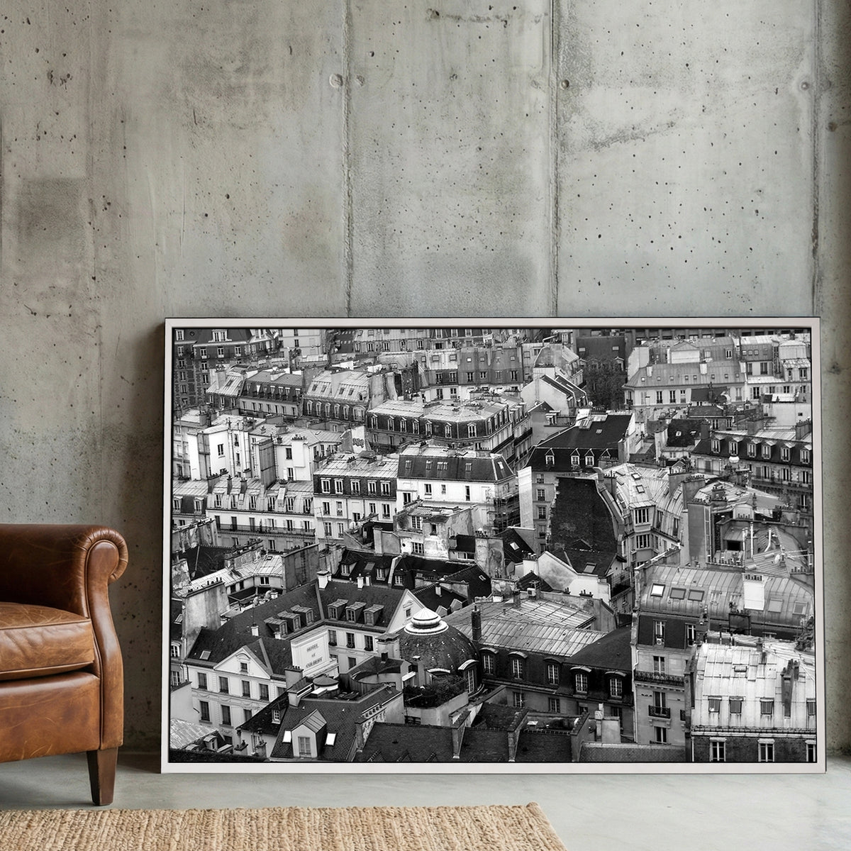 Paris Rooftops Black and White canvas wall art print displayed in a styled living room