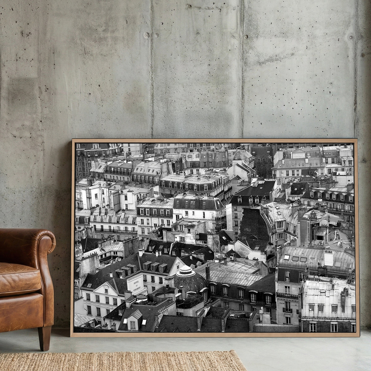 Paris Rooftops Black and White canvas wall art print displayed in a styled living room