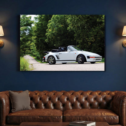 White Porsche 911 Cabriolet canvas wall art print above a sofa in a contemporary living room