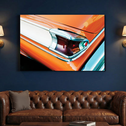 Orange Classic Car Taillight canvas wall art print above a sofa in a contemporary living room