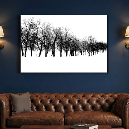 Winter Tree Line canvas wall art print above a sofa in a contemporary living room