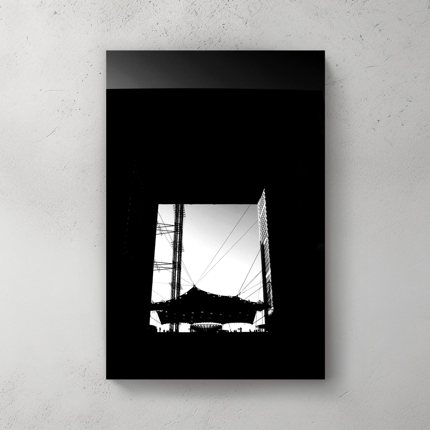 Bold black-and-white silhouette looking up through the Grande Arche at La Defense, cabled canopy below — canvas wall art print