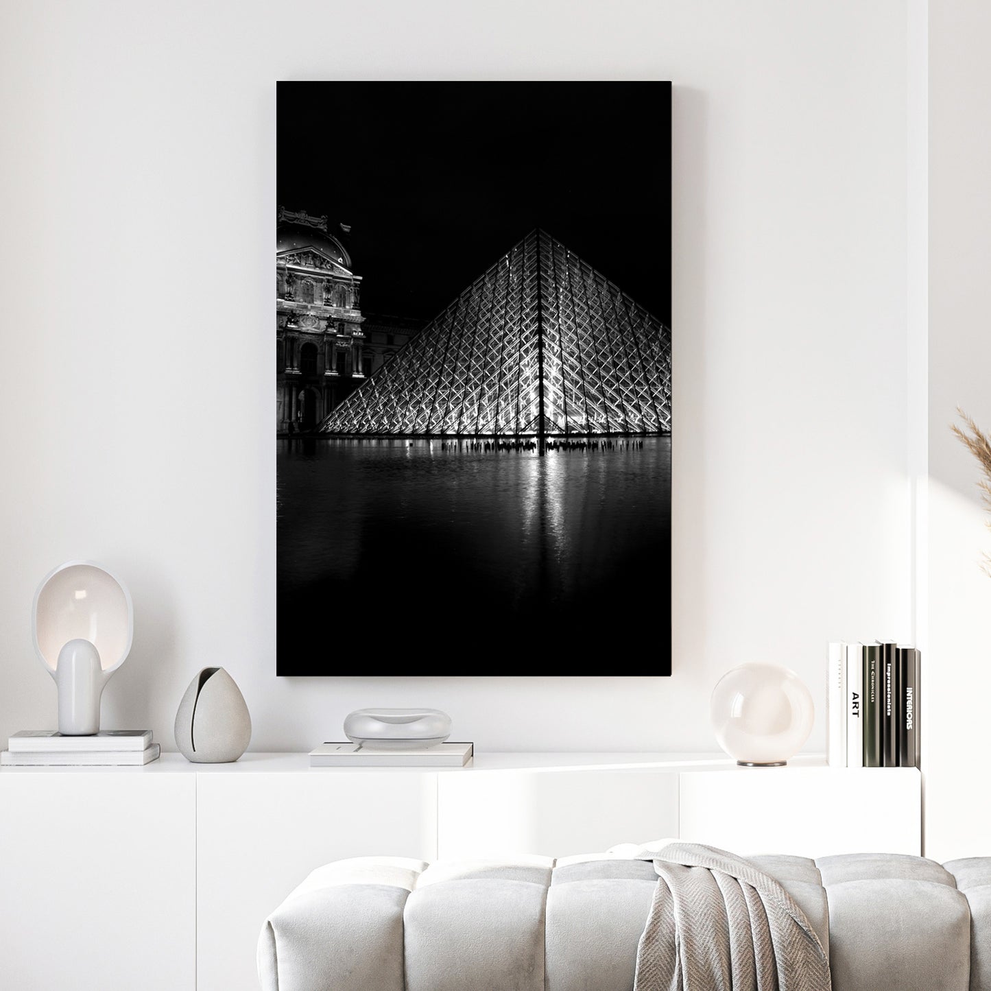 Louvre Pyramid Paris canvas wall art print above a sofa in a contemporary living room